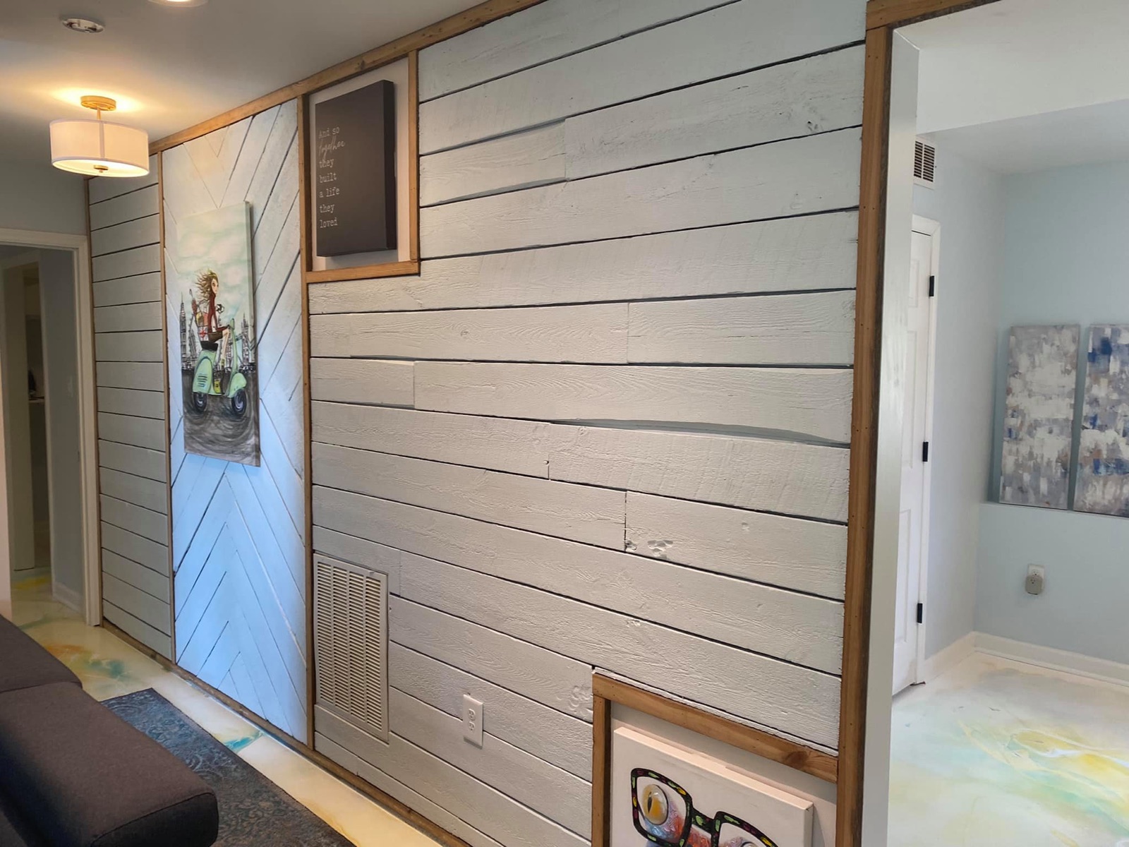 Shiplap accent wall with finish carpentry trim